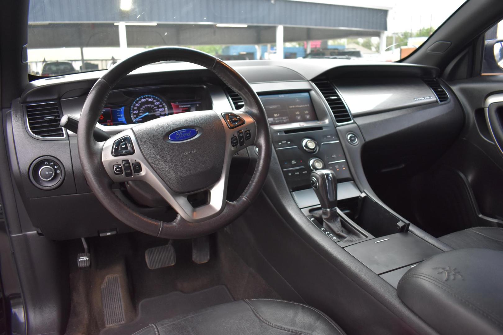 2015 BLACK Ford Taurus SEL FWD (1FAHP2E87FG) with an 3.5L V6 DOHC 24V engine, 6-Speed Automatic transmission, located at 420 E. Kingsbury St., Seguin, TX, 78155, (830) 401-0495, 29.581060, -97.961647 - Photo#6