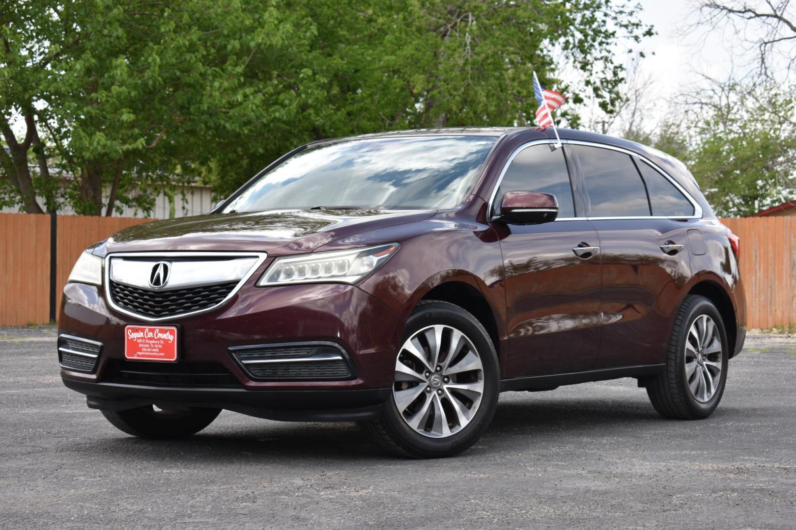 2014 maroon Acura MDX SH-AWD 6-Spd AT w/Tech Package (5FRYD4H46EB) with an 3.5L V6 SOHC 24V engine, 6-Speed Automatic transmission, located at 420 E. Kingsbury St., Seguin, TX, 78155, (830) 401-0495, 29.581060, -97.961647 - Photo#2