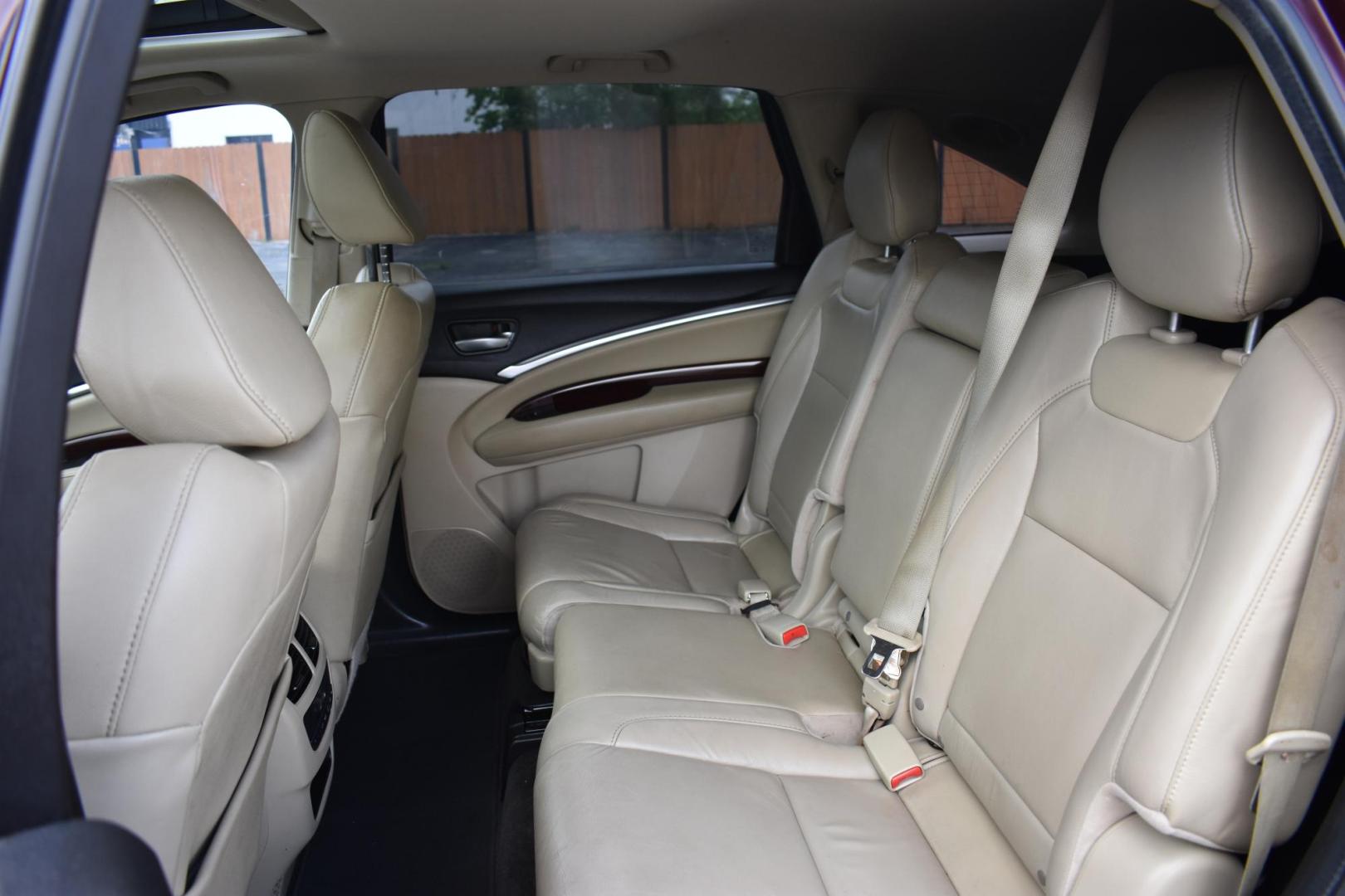 2014 maroon Acura MDX SH-AWD 6-Spd AT w/Tech Package (5FRYD4H46EB) with an 3.5L V6 SOHC 24V engine, 6-Speed Automatic transmission, located at 420 E. Kingsbury St., Seguin, TX, 78155, (830) 401-0495, 29.581060, -97.961647 - Photo#4