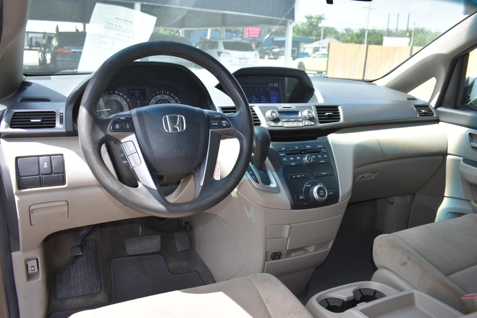 2013 TAN Honda Odyssey LX (5FNRL5H27DB) with an 3.5L V6 SOHC 24V engine, 5-Speed Automatic transmission, located at 420 E. Kingsbury St., Seguin, TX, 78155, (830) 401-0495, 29.581060, -97.961647 - Photo#3