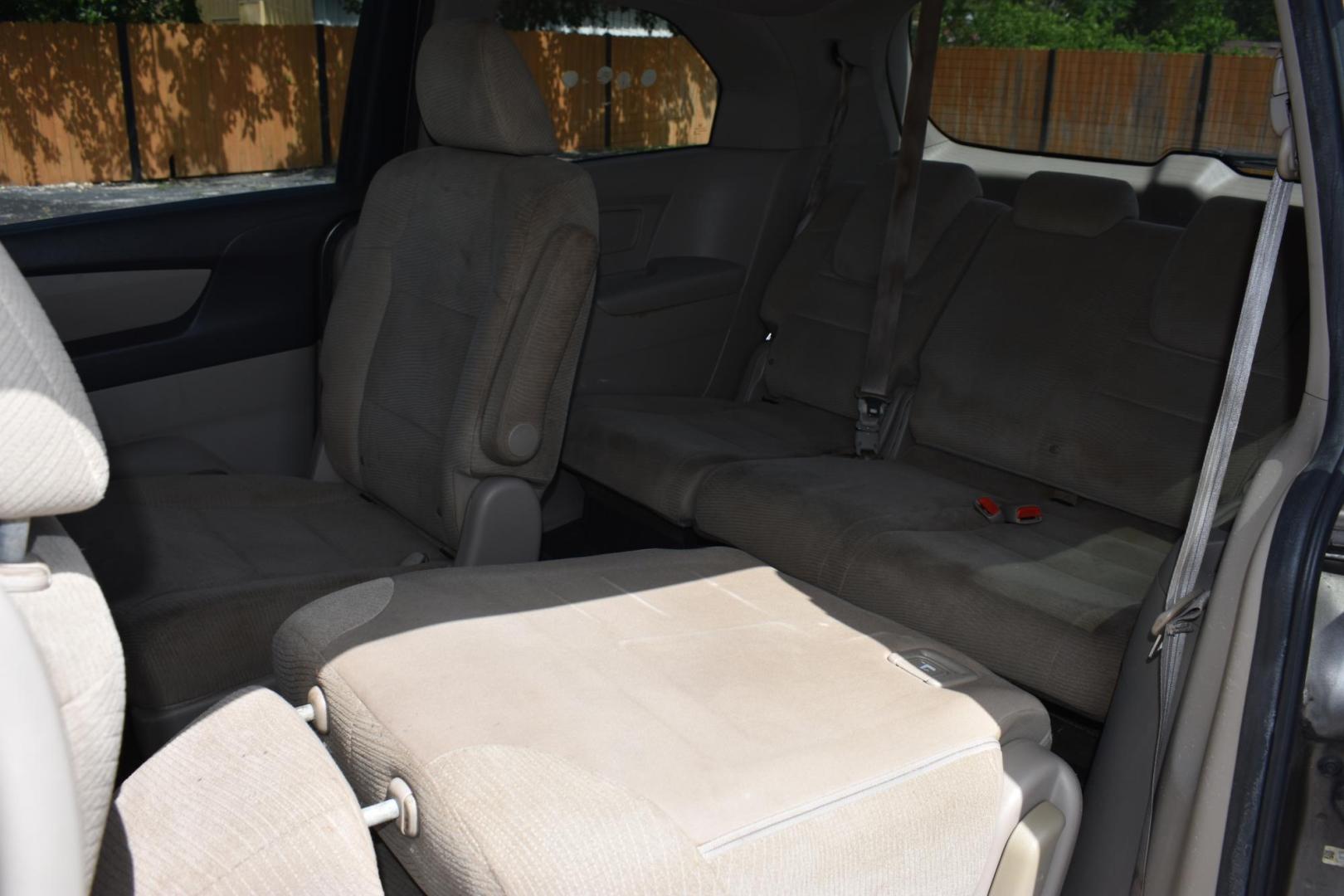 2013 TAN Honda Odyssey LX (5FNRL5H27DB) with an 3.5L V6 SOHC 24V engine, 5-Speed Automatic transmission, located at 420 E. Kingsbury St., Seguin, TX, 78155, (830) 401-0495, 29.581060, -97.961647 - Photo#4