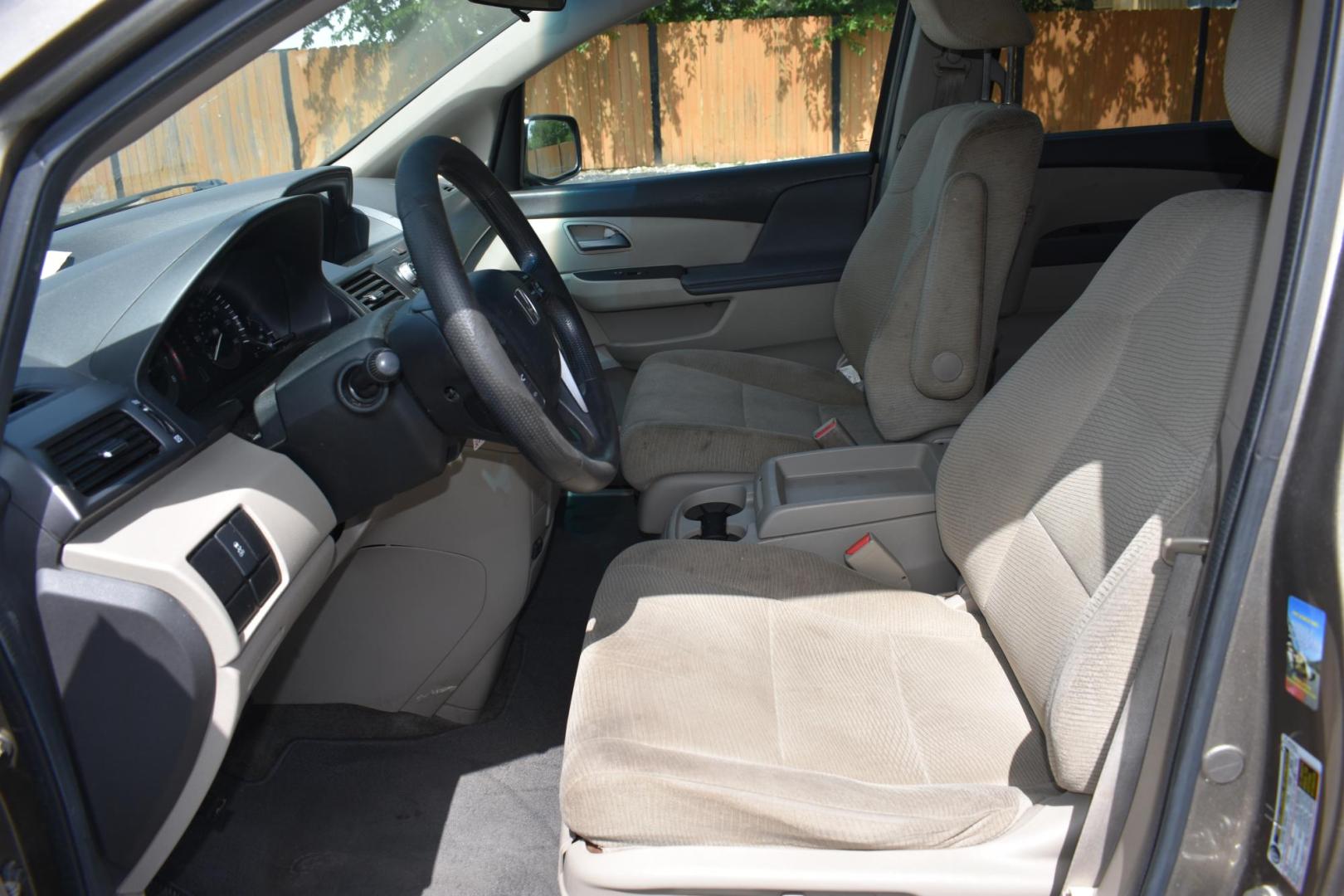 2013 TAN Honda Odyssey LX (5FNRL5H27DB) with an 3.5L V6 SOHC 24V engine, 5-Speed Automatic transmission, located at 420 E. Kingsbury St., Seguin, TX, 78155, (830) 401-0495, 29.581060, -97.961647 - Photo#5