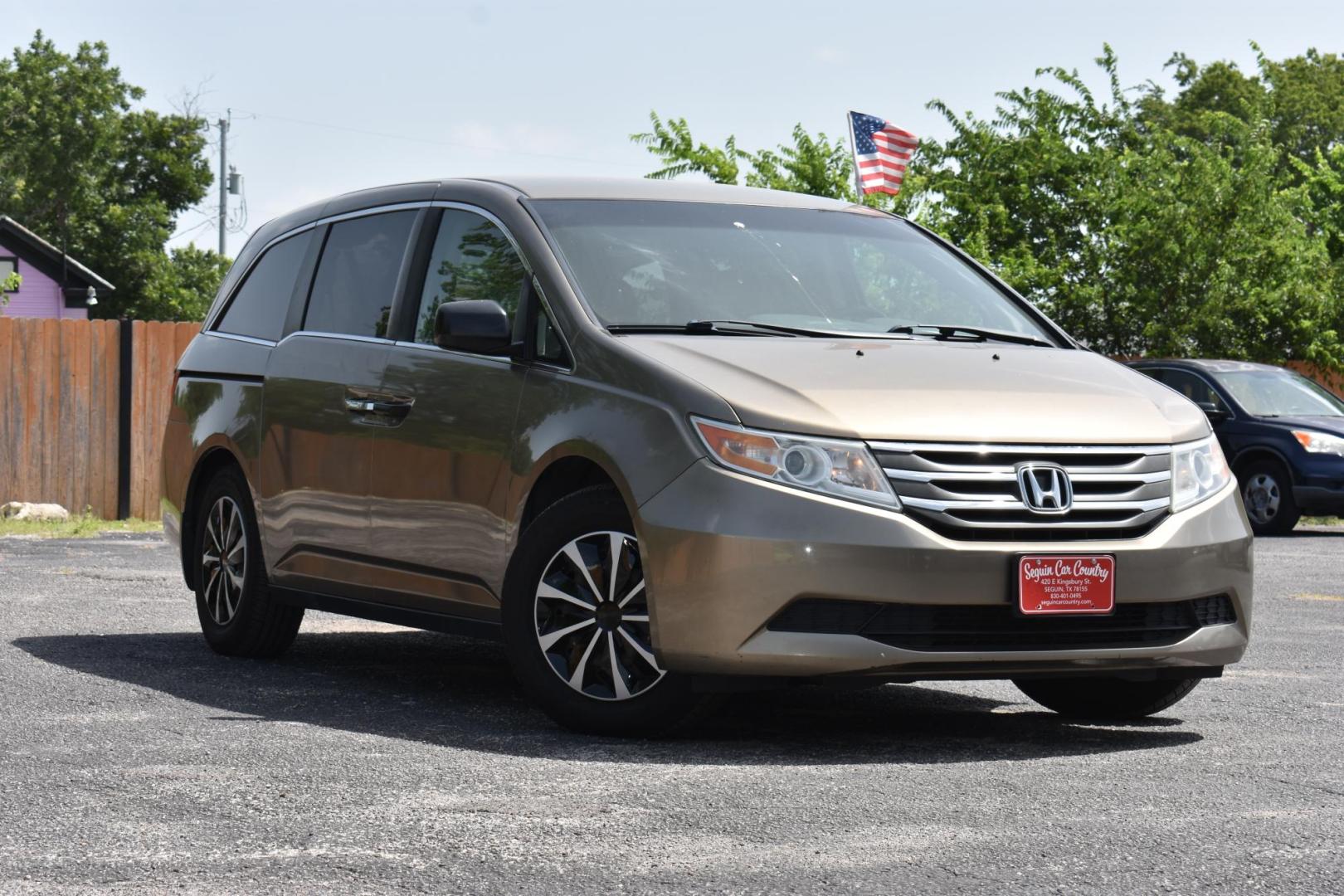 2013 TAN Honda Odyssey LX (5FNRL5H27DB) with an 3.5L V6 SOHC 24V engine, 5-Speed Automatic transmission, located at 420 E. Kingsbury St., Seguin, TX, 78155, (830) 401-0495, 29.581060, -97.961647 - Photo#0