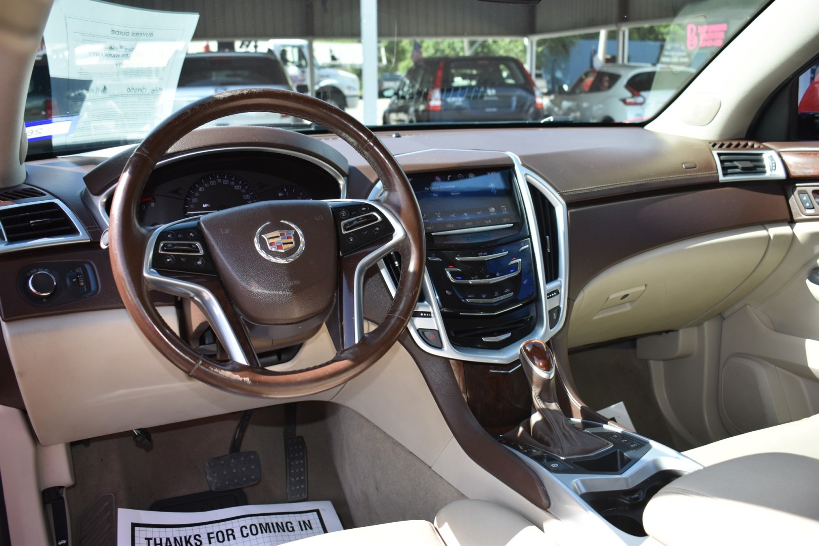 2016 RED CADILLAC SRX Luxury Collection FWD (3GYFNBE34GS) with an 3.6L V6 DOHC 24V FFV engine, 6-SPEED AUTOMATIC transmission, located at 420 E. Kingsbury St., Seguin, TX, 78155, (830) 401-0495, 29.581060, -97.961647- Photo#3