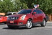 2016 RED CADILLAC SRX Luxury Collection FWD (3GYFNBE34GS) with an 3.6L V6 DOHC 24V FFV engine, 6-SPEED AUTOMATIC transmission, located at 420 E. Kingsbury St., Seguin, TX, 78155, (830) 401-0495, 29.581060, -97.961647- Photo#1