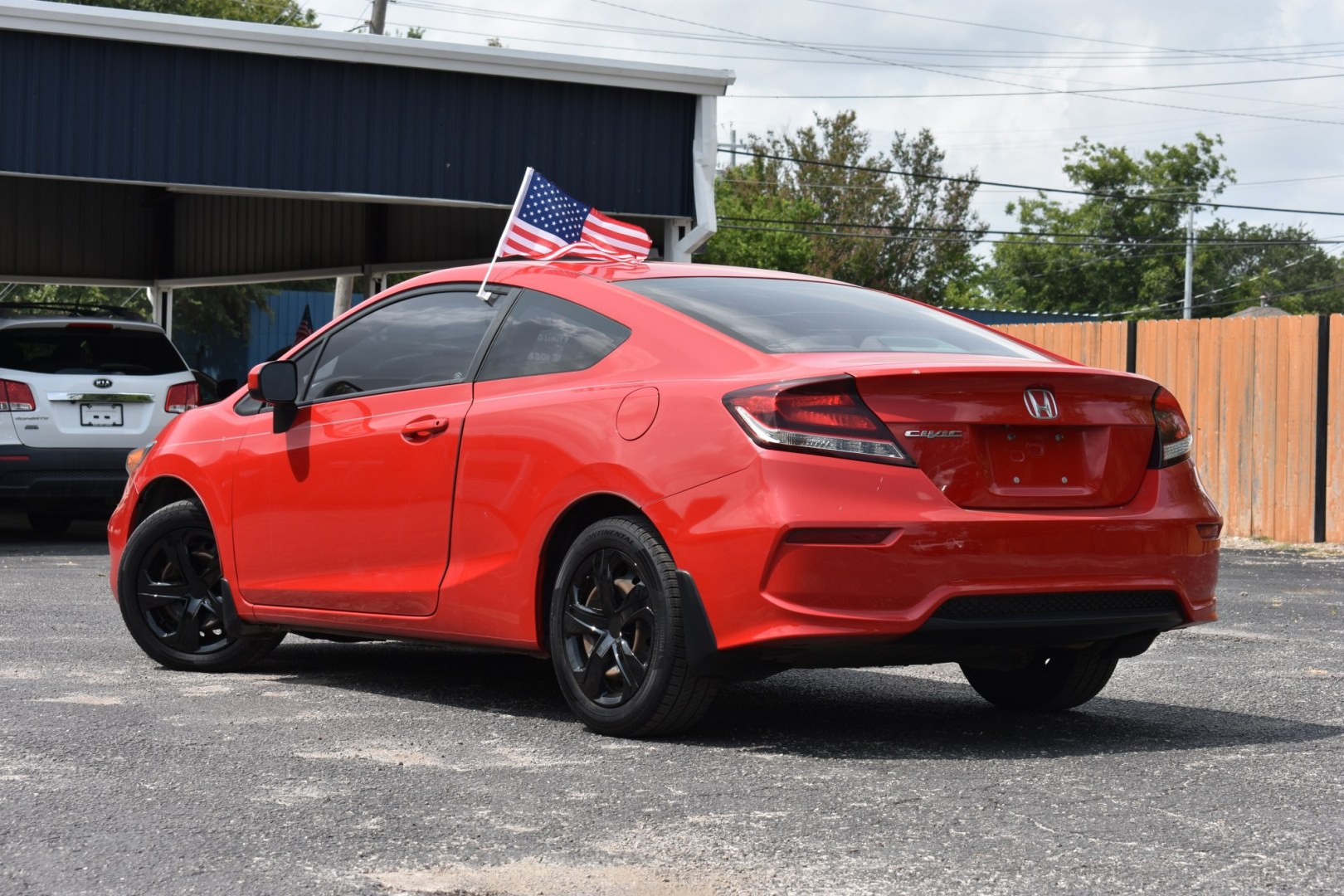 2015 RED HONDA CIVIC LX Coupe CVT (2HGFG3B5XFH) with an 1.8L L4 SOHC 16V engine, CVT transmission, located at 420 E. Kingsbury St., Seguin, TX, 78155, (830) 401-0495, 29.581060, -97.961647- Photo#2