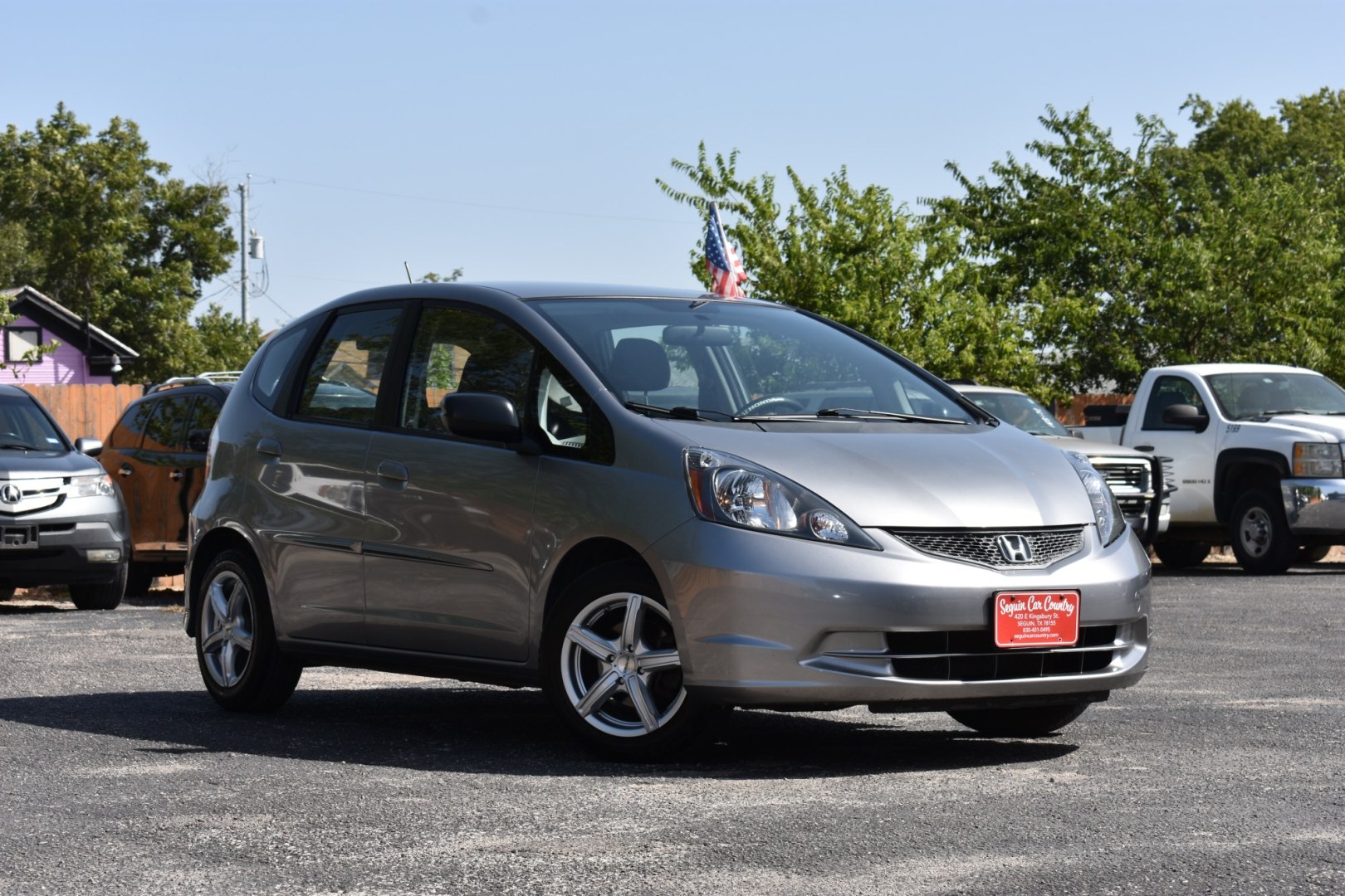 2009 SILVER HONDA FIT 5-Speed AT (JHMGE88269S) with an 1.5L L4 SOHC 16V engine, 5-SPEED AUTOMATIC transmission, located at 420 E. Kingsbury St., Seguin, TX, 78155, (830) 401-0495, 29.581060, -97.961647- Photo#0