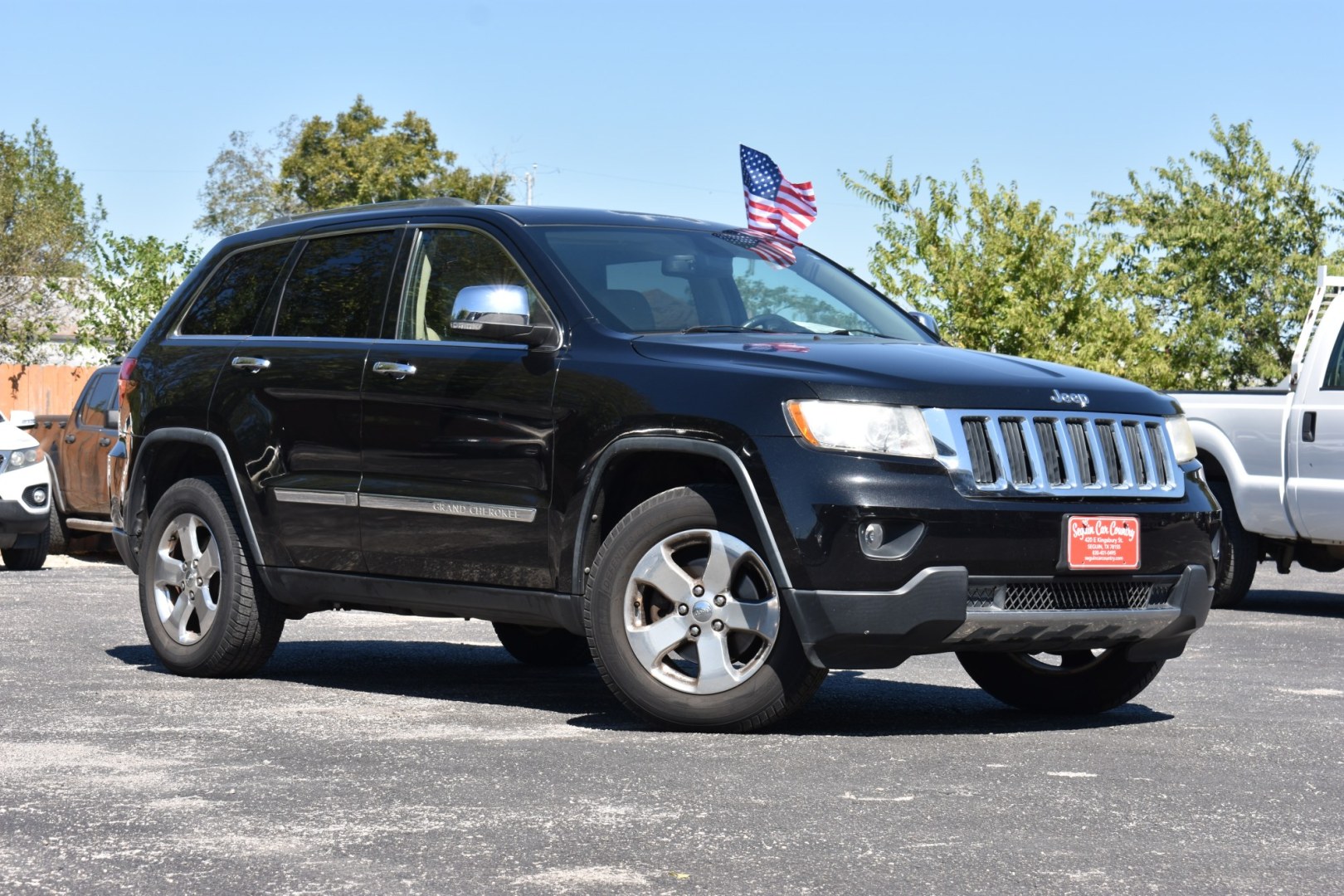 2013 BLACK JEEP GRAND CHEROKEE Limited 4WD (1C4RJFBG7DC) with an 3.6L V6 DOHC 24V engine, 5-SPEED AUTOMATIC transmission, located at 420 E. Kingsbury St., Seguin, TX, 78155, (830) 401-0495, 29.581060, -97.961647- Photo#0